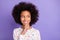 Photo of minded pretty dark skin girl wear white dotted pullover look empty space isolated on violet color background