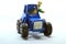 Photo of a miniature tractor as a tool to introduce agricultural equipment to children in school
