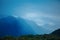 Photo of mountains, dark sky in Norway .