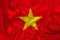 Photo of the national flag of Vietnam on a luxurious texture of satin, silk with waves, folds and highlights, close-up, copy space