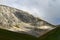 Photo of nature - wonderful stony mountain cliff with blue sky