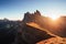 Photo near the edge. Beautiful sunset in the Italian majestic Seceda dolomite mountains