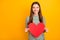 Photo of nice beautiful charming enchanting girl holding red heart of love in order to celebrate her boyfriend while