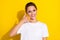 Photo of nice brown short hairdo young lady call me wear white t-shirt isolated on yellow color background