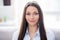 Photo of nice optimistic brunette lady wear blue shirt alone at home