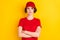 Photo of nice serious brown hair lady crossed arms wear t-shirt cap isolated on yellow color background