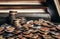 Photo of old books stacked on wold coin pile