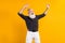 Photo of old cool funny funky man look empty space dance enjoy isolated on shine yellow color background
