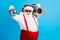 Photo of old man grey beard raise hands hold vintage glowing ball boom box wear santa claus x-mas costume suspenders