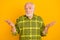 Photo of old man pensioner shrug shoulders confused questioned no answer isolated over yellow color background