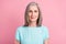 Photo of optimistic aged grey hairdo lady wear blue blouse isolated on pink color background