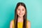 Photo of optimistic nice brown hair girl wear yellow dress isolated on bright teal color background