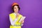 Photo of optimistic nice brunette hair lady write look empty space wear builder uniform isolated on purple color