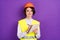 Photo of optimistic nice brunette hair lady write wear builder uniform isolated on purple color background
