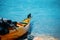 Photo of orange kayak on blue sea in Norway on summer