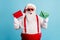 Photo of pensioner old man grey beard hold envelopes terminal postman deliver children letters wear santa costume