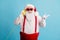 Photo of pensioner old man grey beard hold retro telephone tell elves prepare presents delivery wear santa costume red