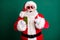 Photo of pensioner stylish grandfather grey hair beard hold directing finger telephone assure quality wear red santa x