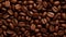 Photo of a pile of freshly roasted coffee beans
