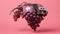 a photo of a pink object with a bunch of grapes attached to it