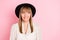 Photo of playful tricky lady bite lip look empty space wear retro hat dotted blouse isolated pink color background