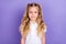 Photo portrait of adorable little pupil girl ponytails smiling dressed trendy white blouse uniform  on violet
