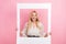 Photo portrait of attractive blonde woman white polaroid retro paper frame dressed stylish white clothes isolated on