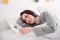 Photo portrait of attractive young woman lying read bad news device dressed stylish gray pajama  on white modern