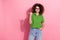 Photo portrait of attractive young woman point cheerful empty space dressed stylish green clothes isolated on pink color