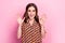 Photo portrait of attractive young woman raise palms excited impressed astonished wear trendy print look isolated on