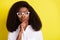 Photo portrait of business woman wearing glasses thoughtful touching chin looking copyspace isolated vibrant yellow