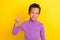 Photo portrait of cute little boy showing v-sign optimistic beaming smile wear trendy violet garment isolated on yellow