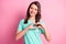 Photo portrait of flirty coquettish girlfriend showing heart shape with fingers symbol of love isolated on pastel pink