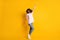 Photo portrait full length of disco star girl pointing finger up isolated on vivid yellow colored background