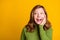 Photo portrait girl surprised looking copyspace hands near face  vibrant yellow color background