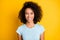 Photo portrait of gorgeous afro american curly girl smiling isolated on vivid yellow colored background