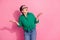 Photo portrait of lovely senior lady shrug shoulders look up empty space dressed stylish green garment isolated on pink