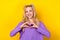 Photo portrait of lovely young lady fingers hands heart symbol showing dressed stylish violet clothes isolated on yellow
