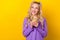 Photo portrait of lovely young lady hold coffee mug look empty space dressed stylish violet garment isolated on yellow