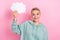 Photo portrait of lovely young lady hold paper cloud comics speech bubble wear trendy khaki garment isolated on pink
