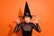 Photo portrait of nice young lady say boo witch frighten disobedient kids dressed trendy black halloween look isolated