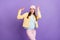 Photo portrait of positive dancing at party woman looking copyspace isolated on pastel violet color background