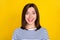 Photo portrait of pretty young lady tongue lick teeth hungry smiling dressed trendy striped clothes isolated on yellow
