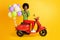 Photo portrait of stunned african american girl winning red motorbike wearing casual green jumper two hands touching