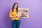 Photo portrait of upset stressed depressed girl holding cardboard looking for job isolated on vivid purple color