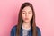 Photo portrait of wearing jeans jacket schoolgirl pouted lips sending air kiss  on pastel pink color background