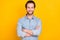 Photo portrait of young business man smiling happy folded hands isolated on vibrant yellow color background