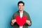 Photo of positive caring guy hold paper heart give present gist his girlfriend isolated on blue color background