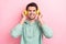 Photo of positive cheerful guy wear stylish yellow new gadget wireless headphones toothy smiling listen jazz music