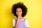 Photo of positive clever little girl finger chin toothy smile wear violet overall isolated yellow color background